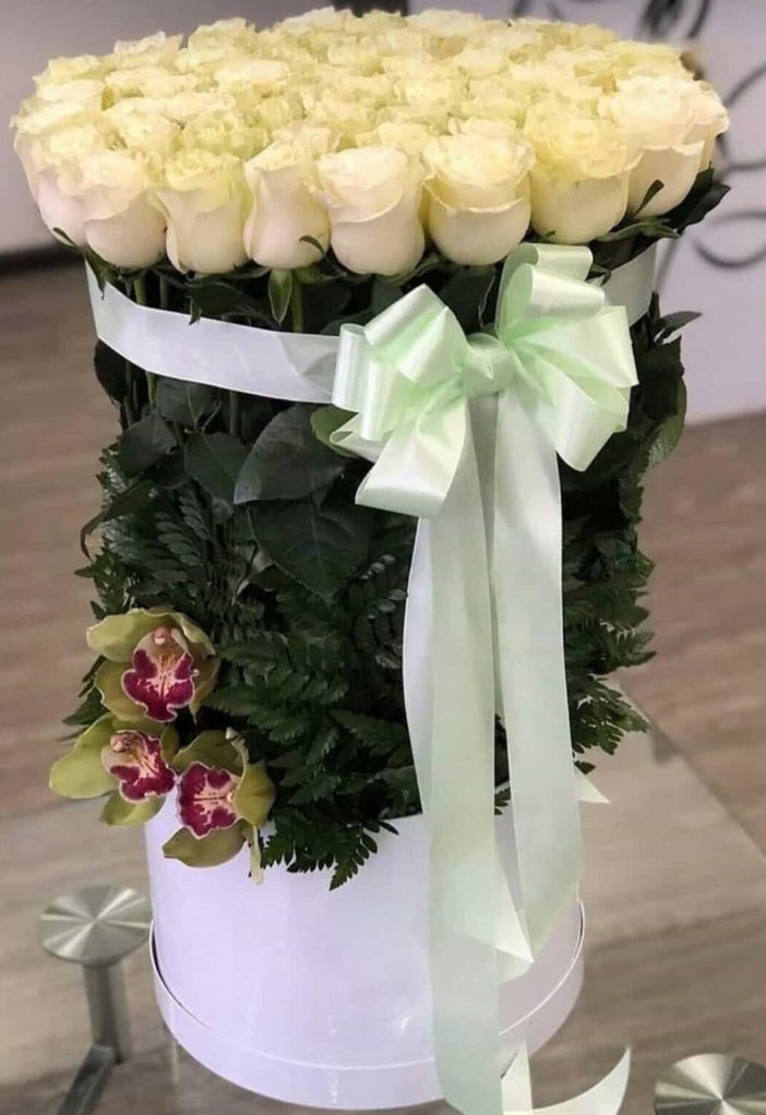 White roses in box
