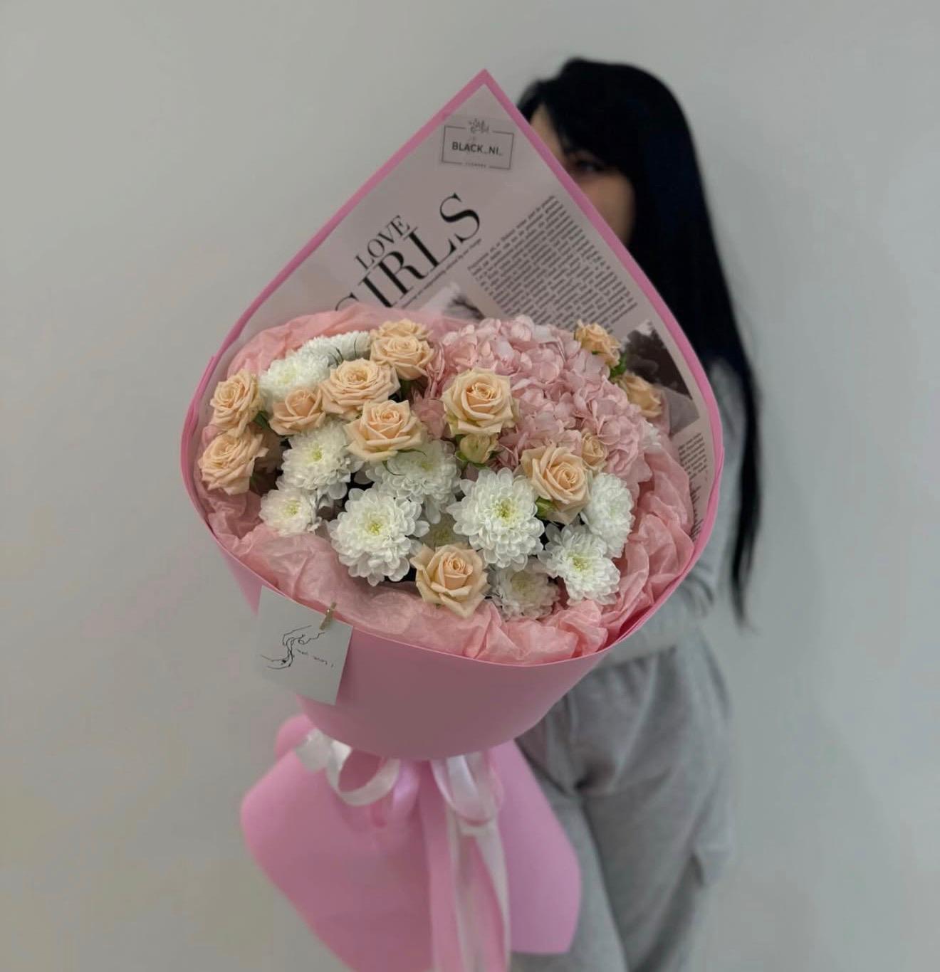 Twelve light pink roses, chrysanthemums, and hydrangeas