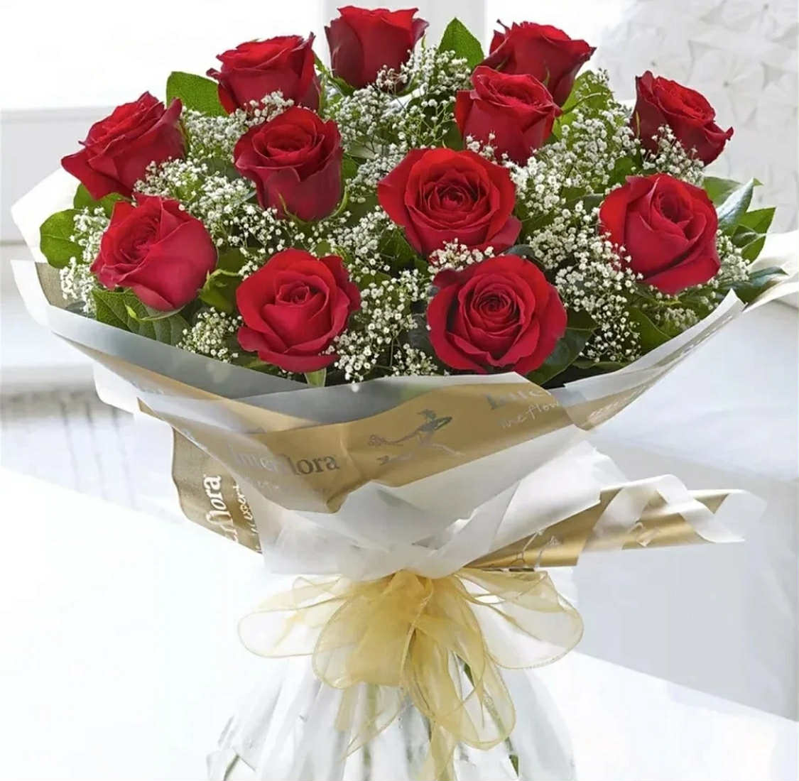 12 Red Roses with Baby’s Breath and Greenery